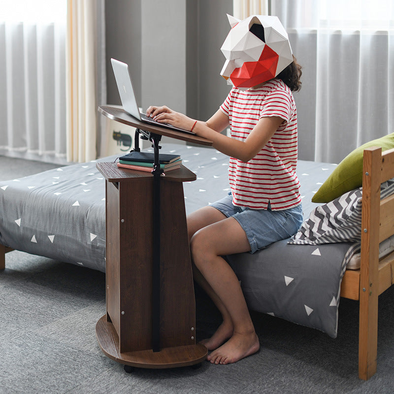 Height-adjustable computer desk, standing and movable.